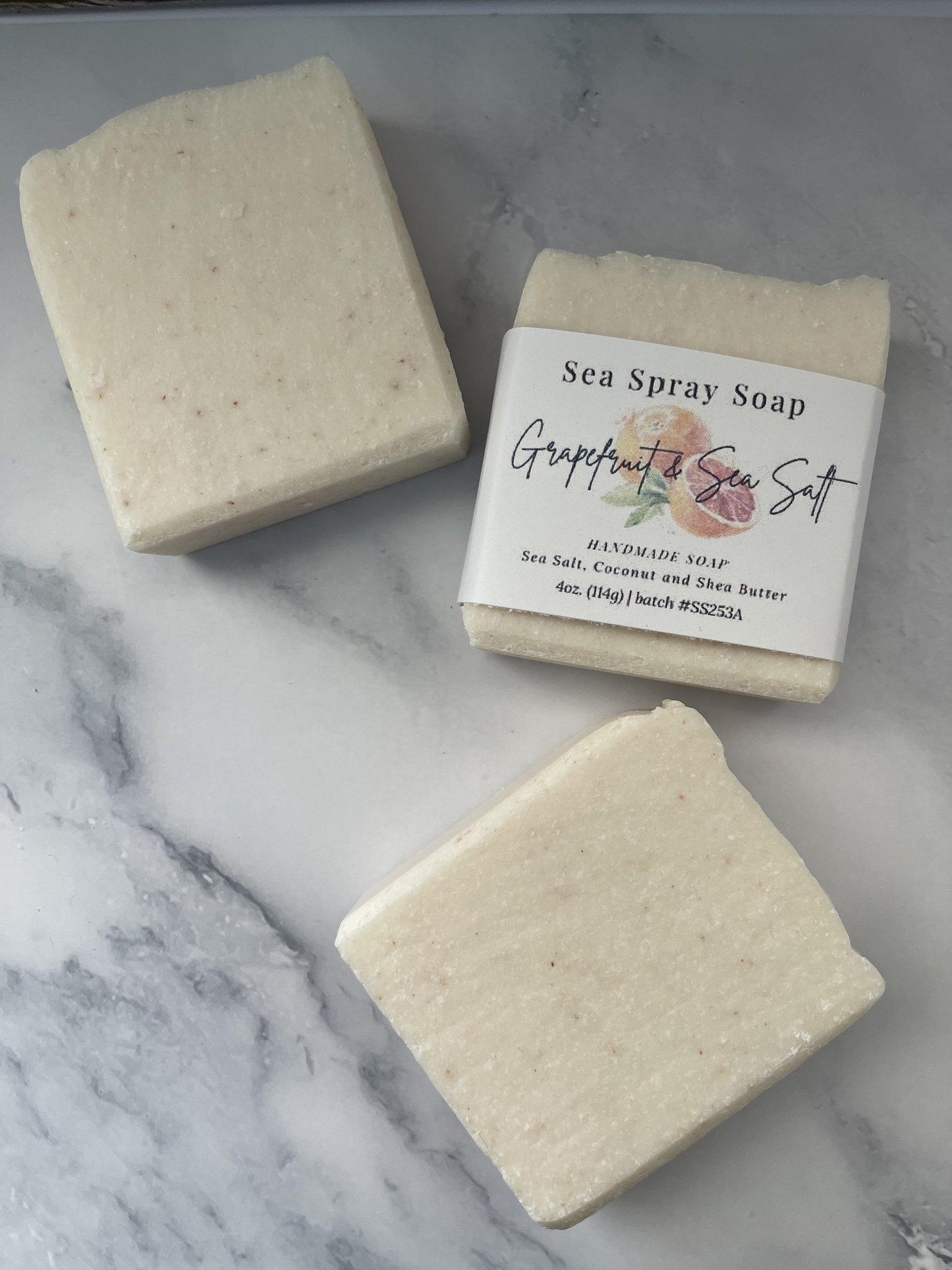Two bars of Sea Spray Soap on a marble surface with a visible label.