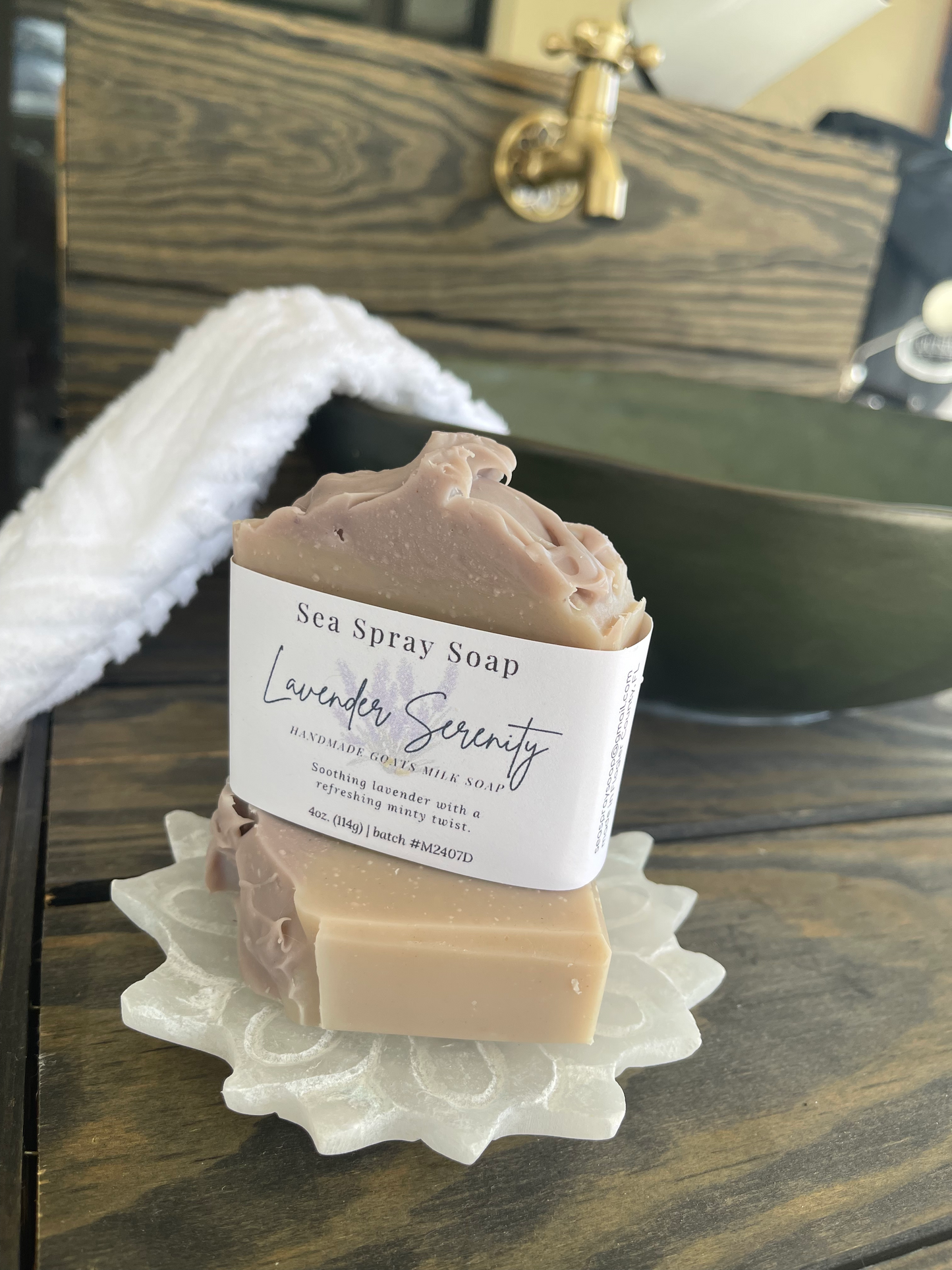 Sea Spray Soap bar with 'Lavender Serenity' label on a decorative stand.