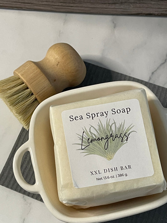 Sea Spray Soap dish with a brush on a marble surface