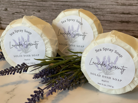 Three bars of Sea Spray Soap with lavender on a wooden background