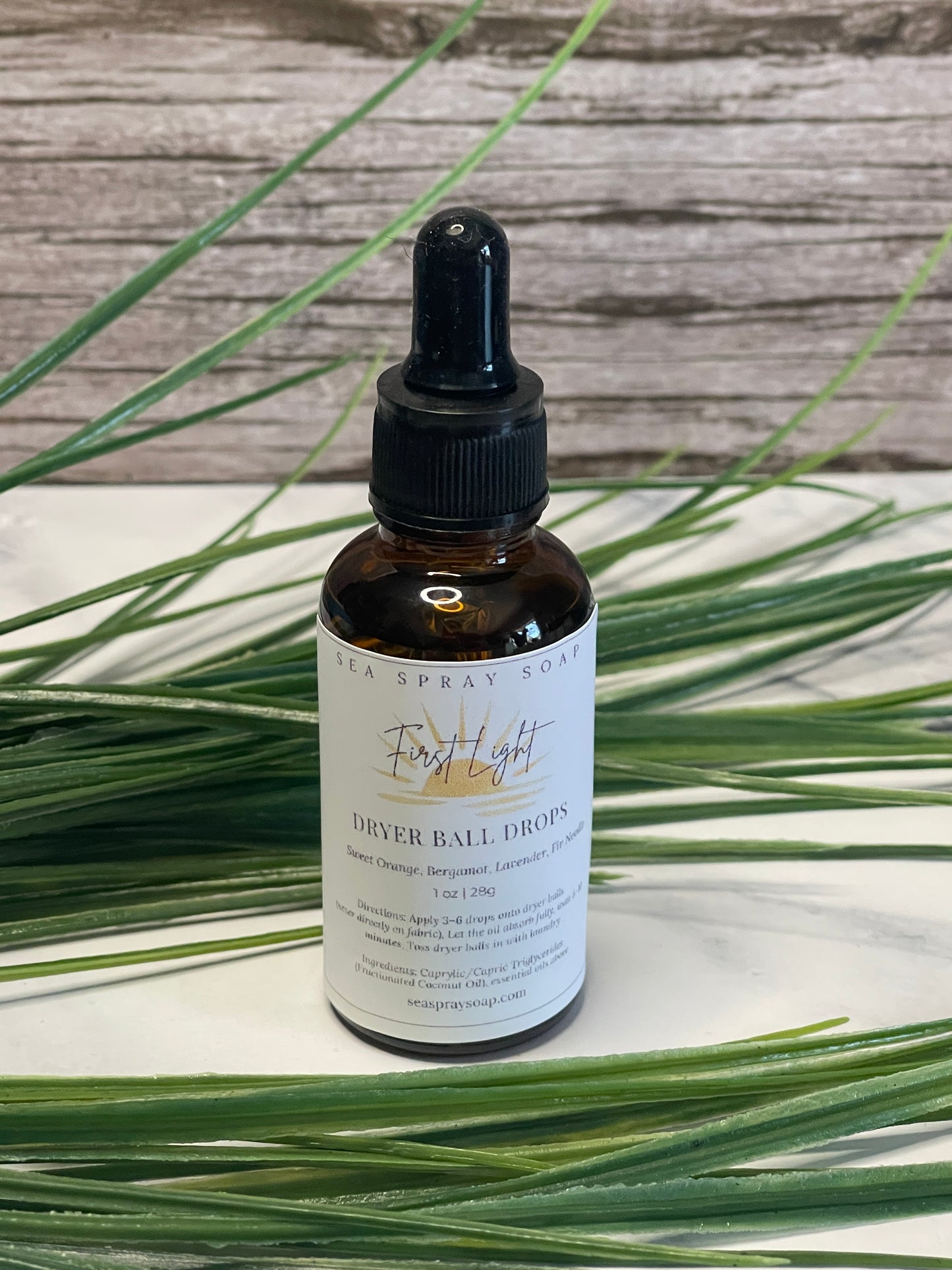 Amber bottle of first flight dryer ball drops