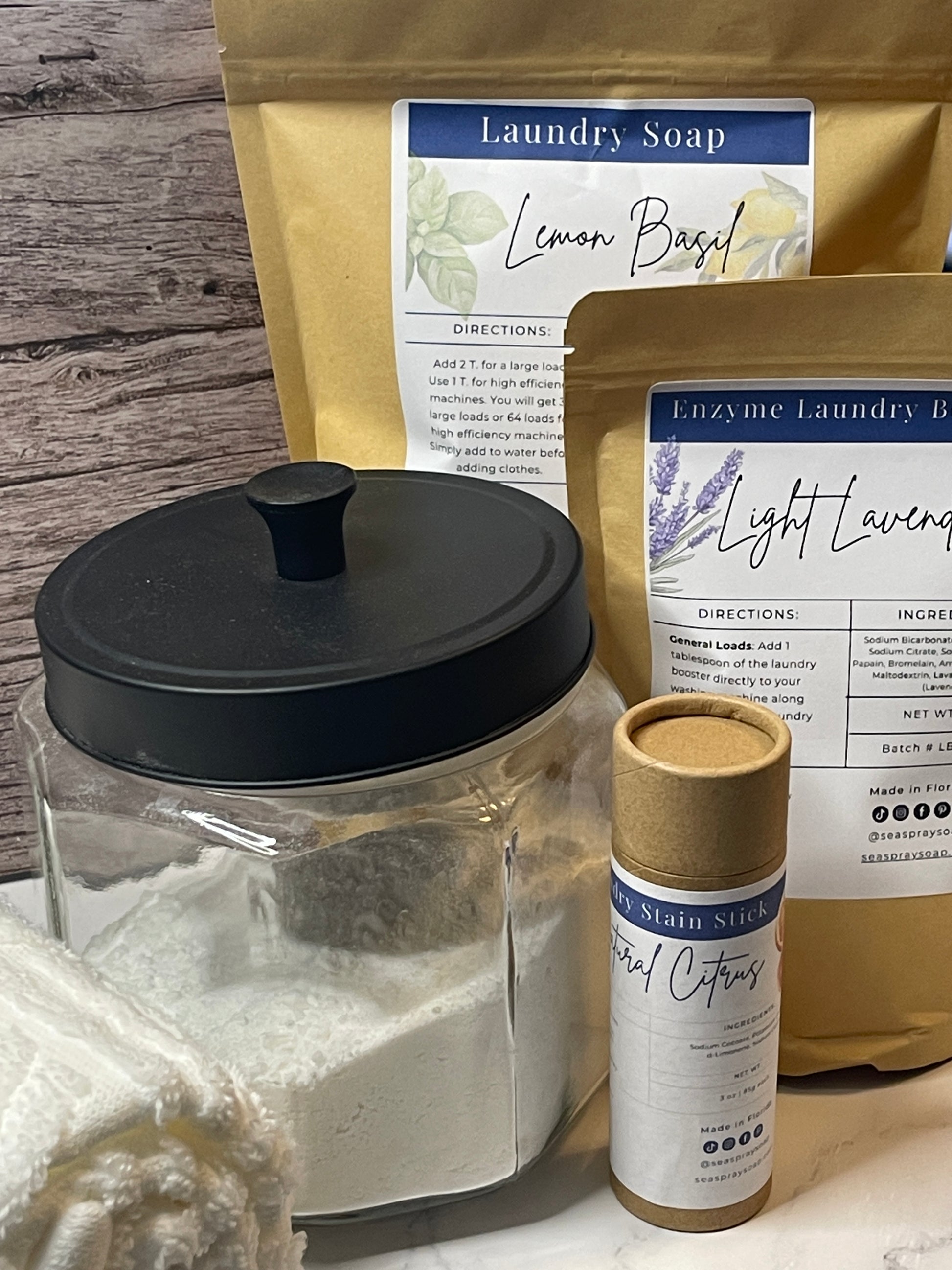 Laundry soap packaging with a black container on a wooden surface