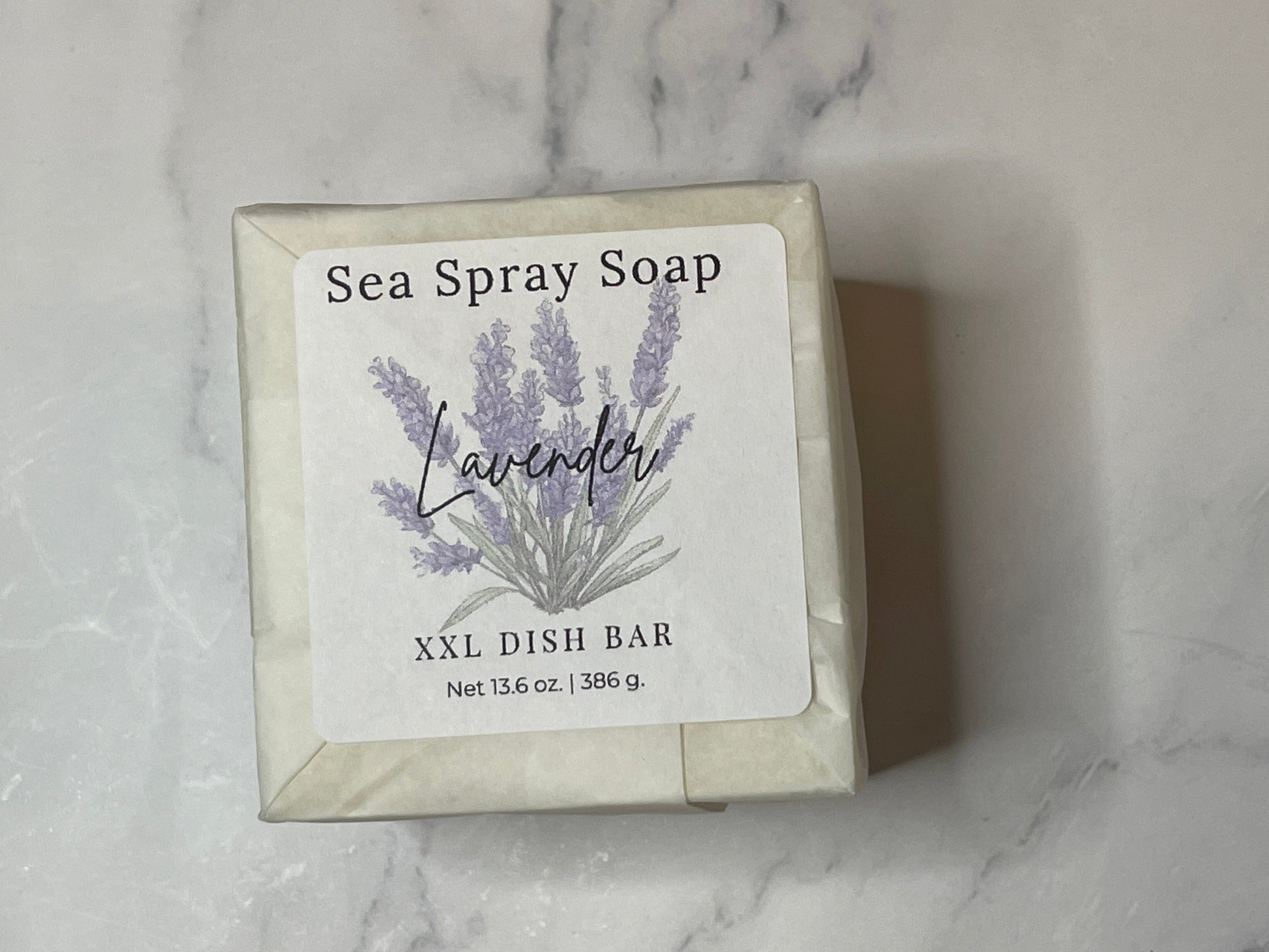 Sea Spray Soap lavender dish bar on a marble background