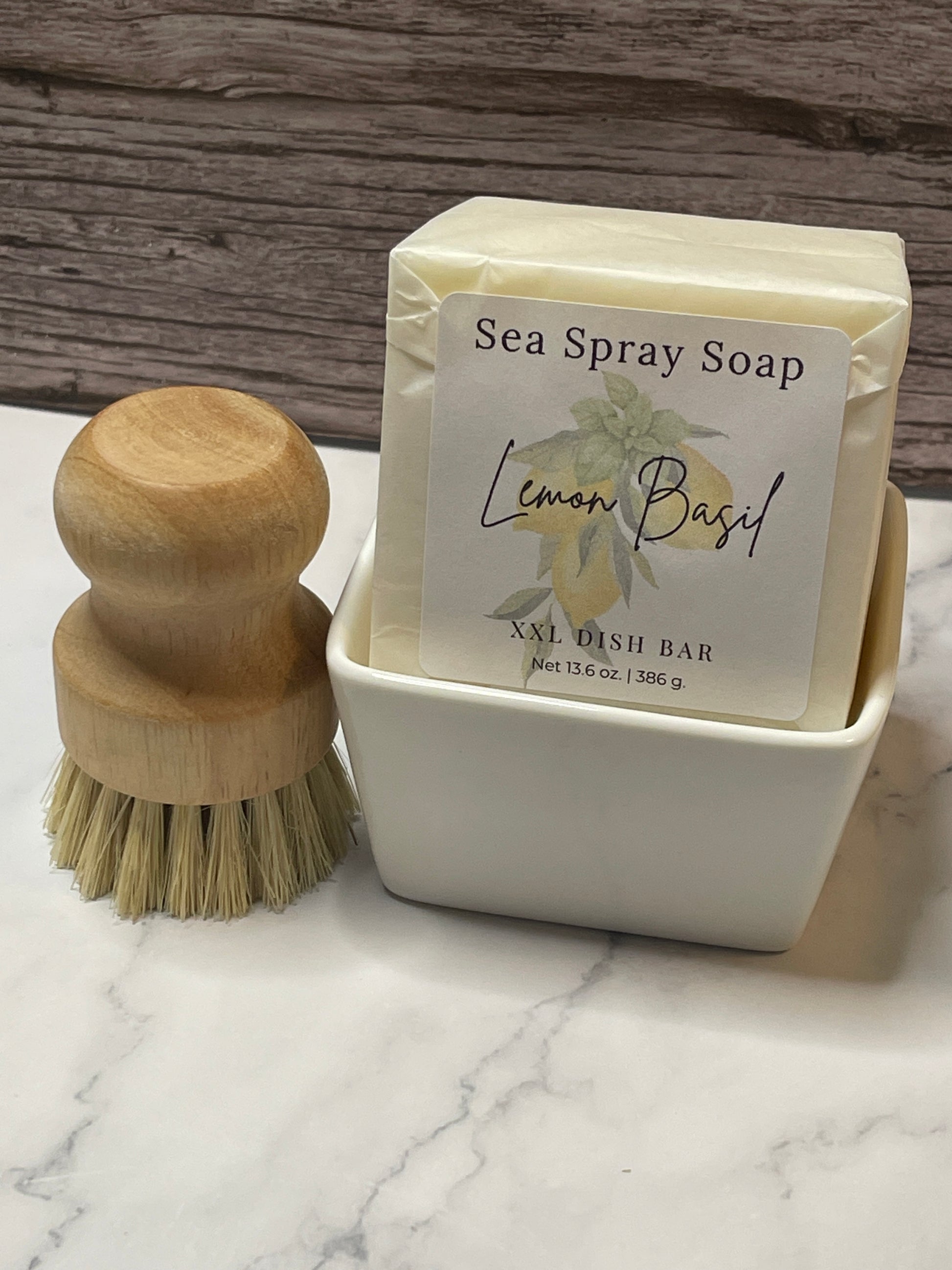 Sea Spray Soap bar with a wooden brush on a marble surface