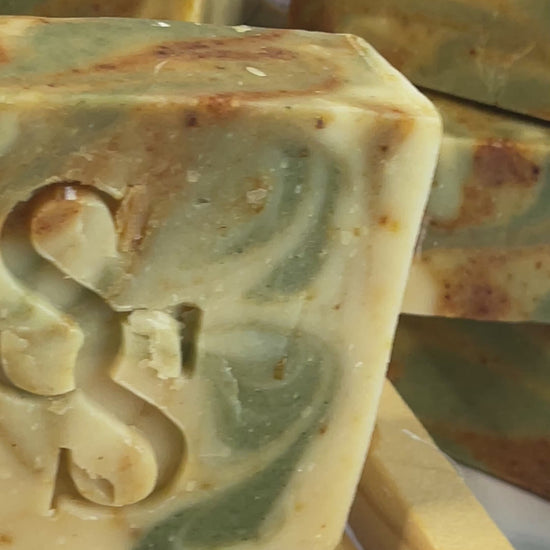 rosemary-lemon-goat-milk-soap-on-wooden-soap-dish