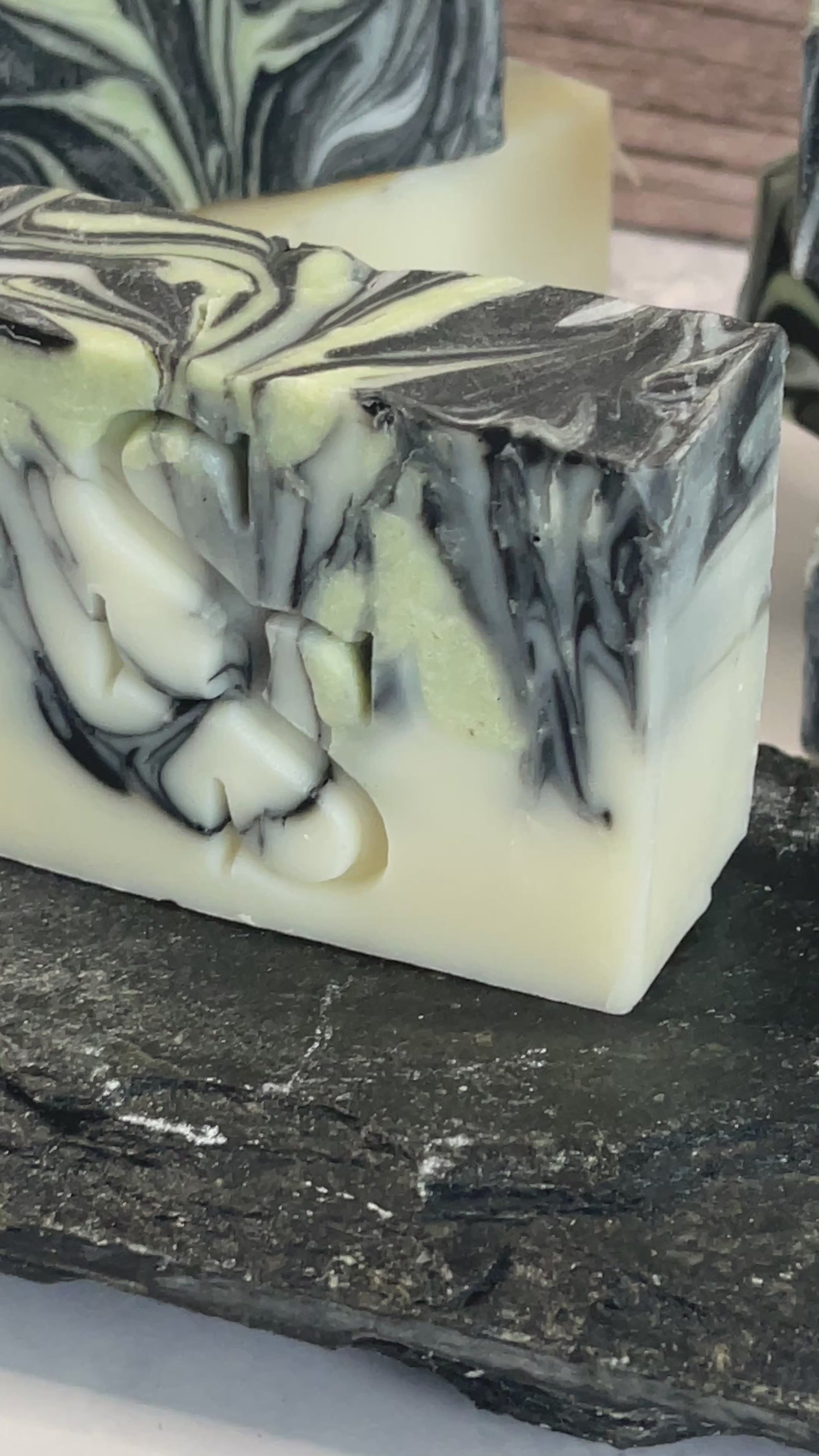 charcoal-clay-clarifying-soap-bar-on-grey-soap-dish