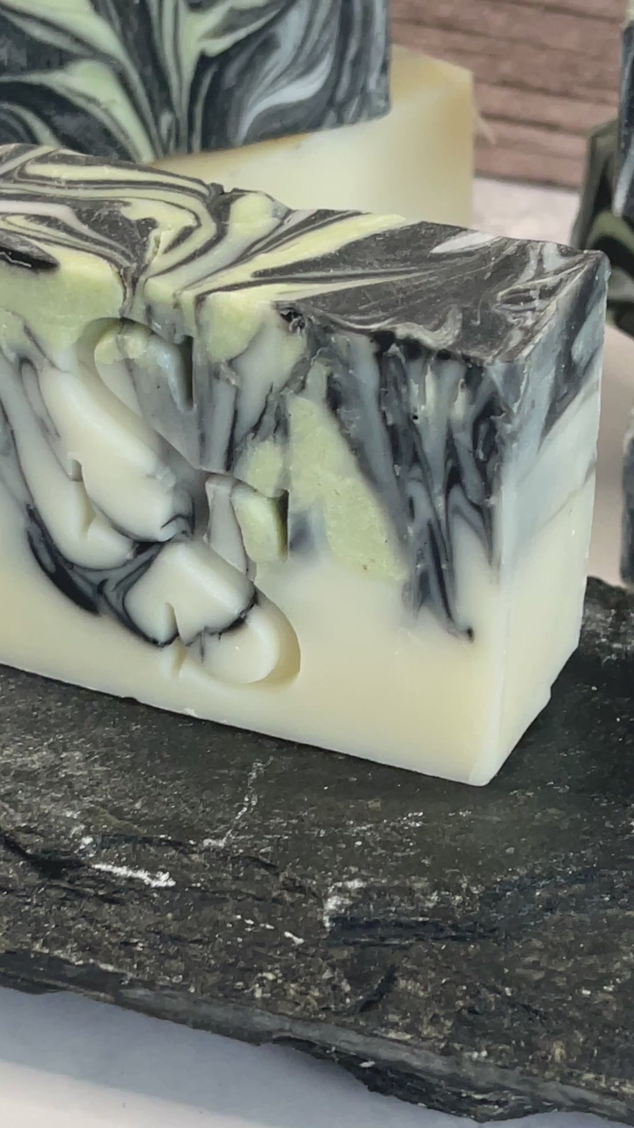 charcoal-clay-clarifying-soap-bar-on-grey-soap-dish