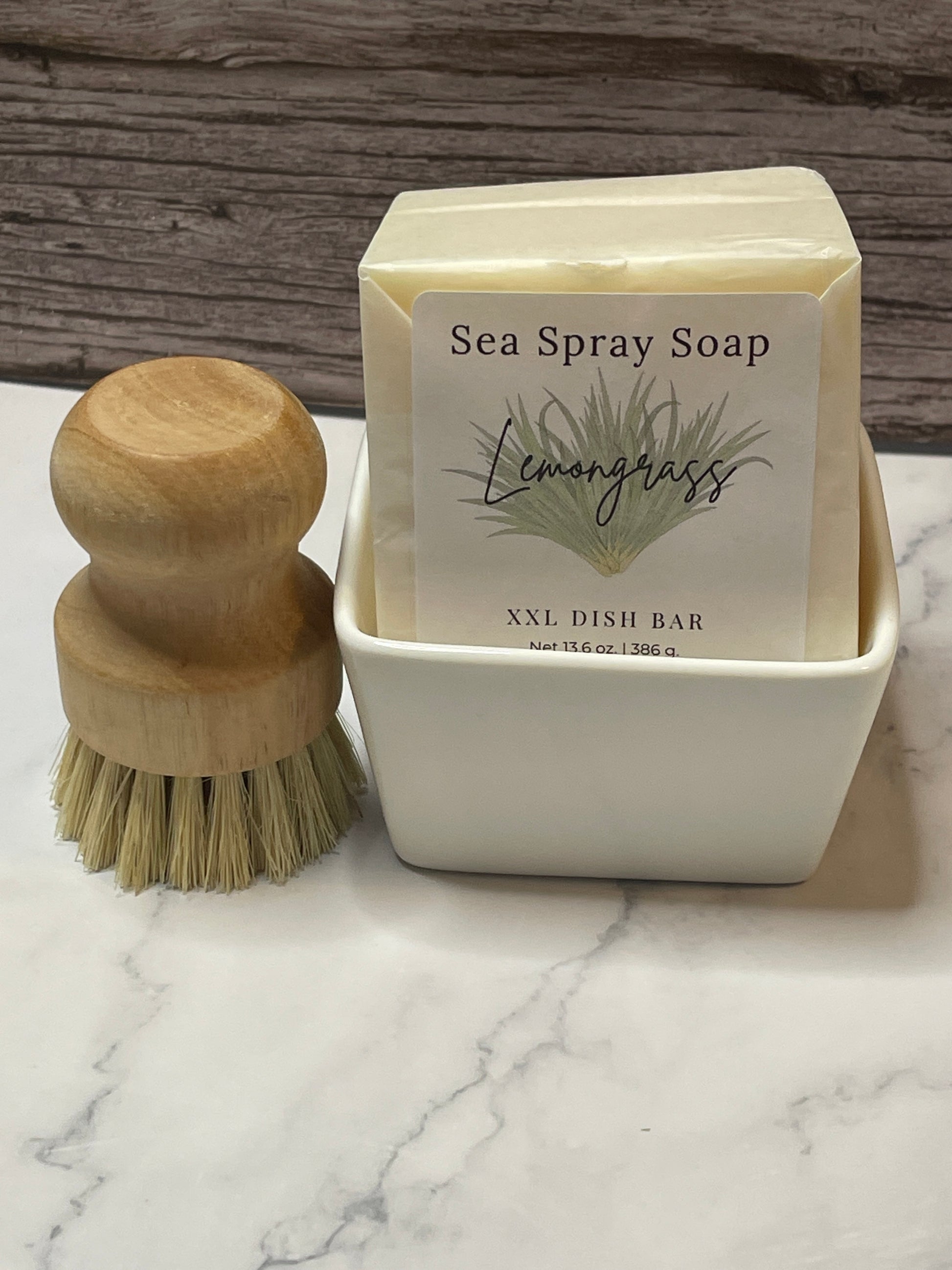 Sea Spray Soap bar with a wooden brush on a marble surface