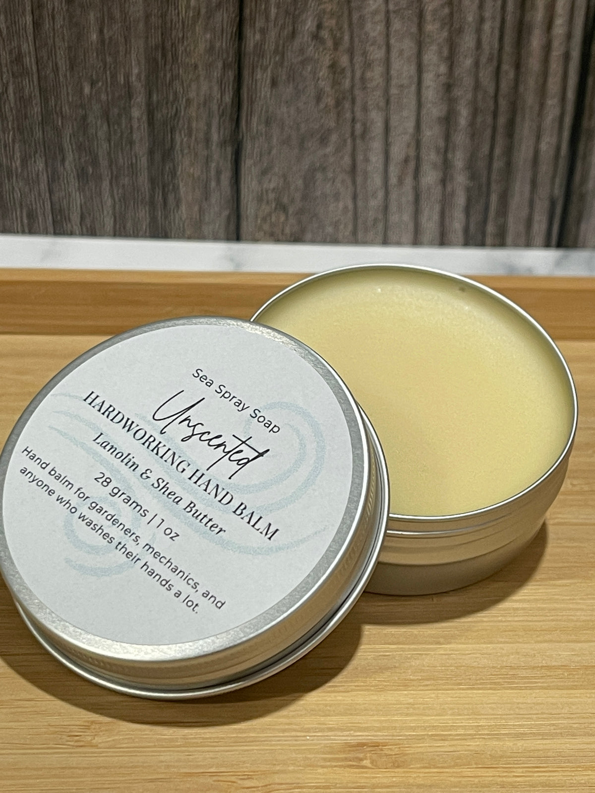 2 oz tin with hardworking hand balm in unscented 