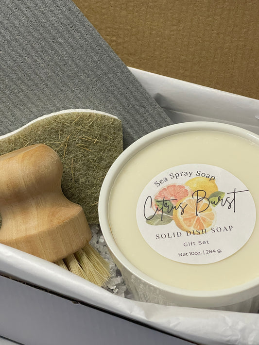 Solid soap bar with a label on a textured surface